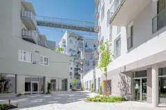 The Campagne Areal residential development in Innsbruck, Austria is centred around outdoor spaces that mimic old towns, a mix between play area, street, laneway, old-fashioned courtyard and garden.