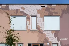 StoEcoshape render tiles combined with render create a unique facade inspired by Esscher's drawings at MSG De Garve in Lochem, The Netherlands