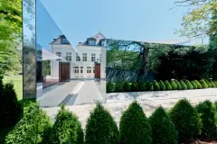 Mirrored glass at a pool house in Vienna reflects the gardens and the main building