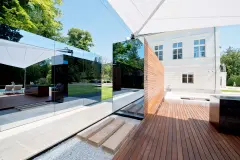 Mirrored StoVentec Glass used on a contemporary pool house in Vienna, Austria