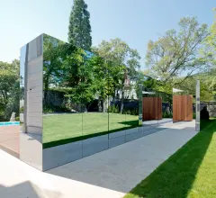 Mirrored StoVentec Glass used on a contemporary pool house in Vienna, Austria