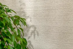 The textured render facade on the internal courtyard-facing walls mimic the pattern of the brickwork on the outer walls, in a matching colour.