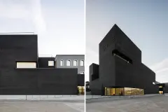 The facade of Trofa Town Hall is at times forbidding, at times inviting - with its black brick facade, the sharp-edged structure positions itself confidently in its urban setting with large openings marking the entrances.