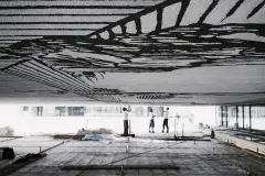 University of Graz Library artwork on underside of canopy, being created with 'sgraffito' render technique