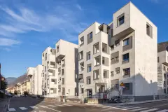 A view of some of the buildings in Via Aslago, Bolzano, Italy after renovation and vertical extension